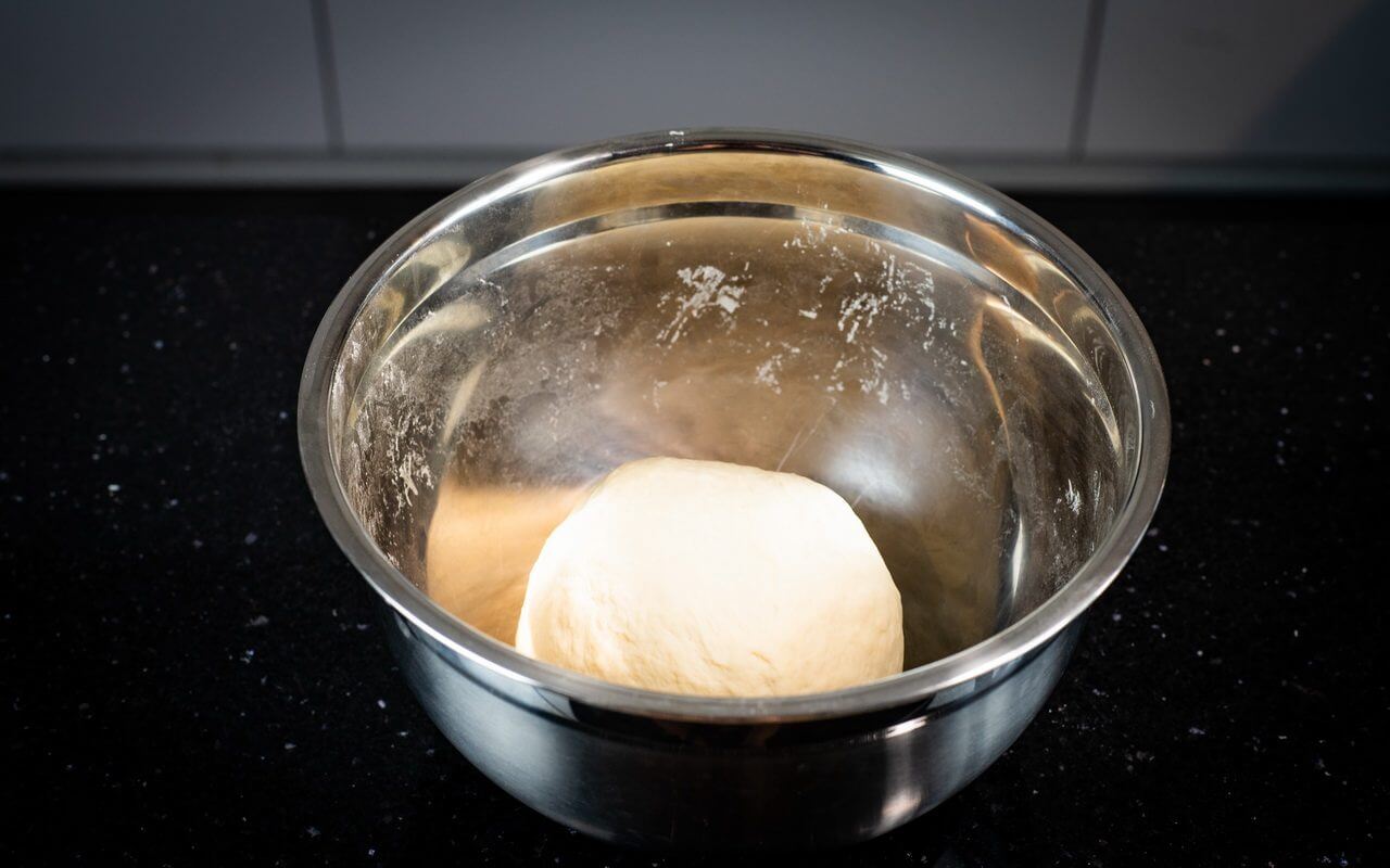 Bread Dough In Mixing Bowl