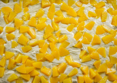 Peach Streusel Cake Peaches On Dough Close up