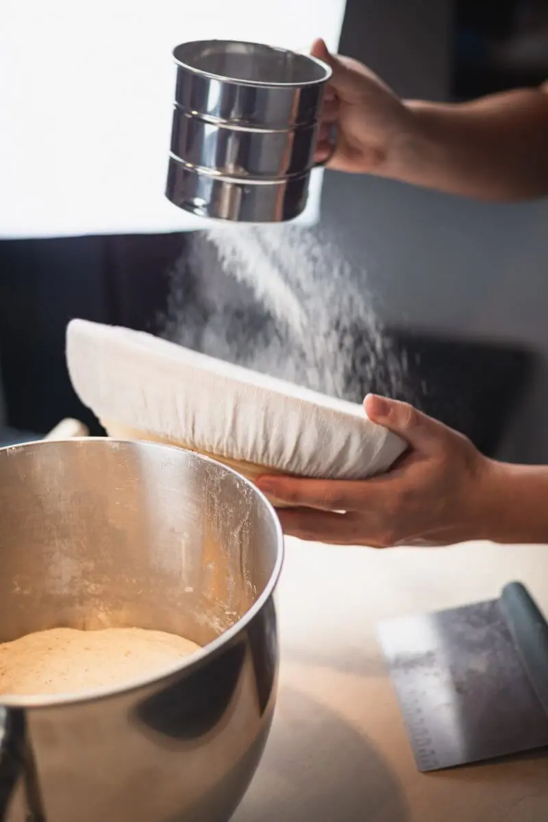 https://delightbaking.com/wp-content/uploads/2019/11/The-Big-Fluffy-Round-Sourdough-Bread-Flouring-Banneton-Proofing-Basket-800x1200.jpg.webp