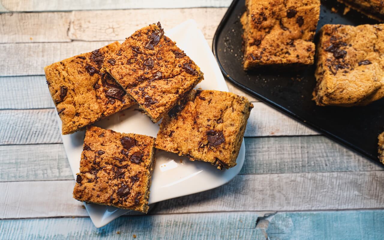 Chewy Chocolate Chip Cookie Bars On A Plate