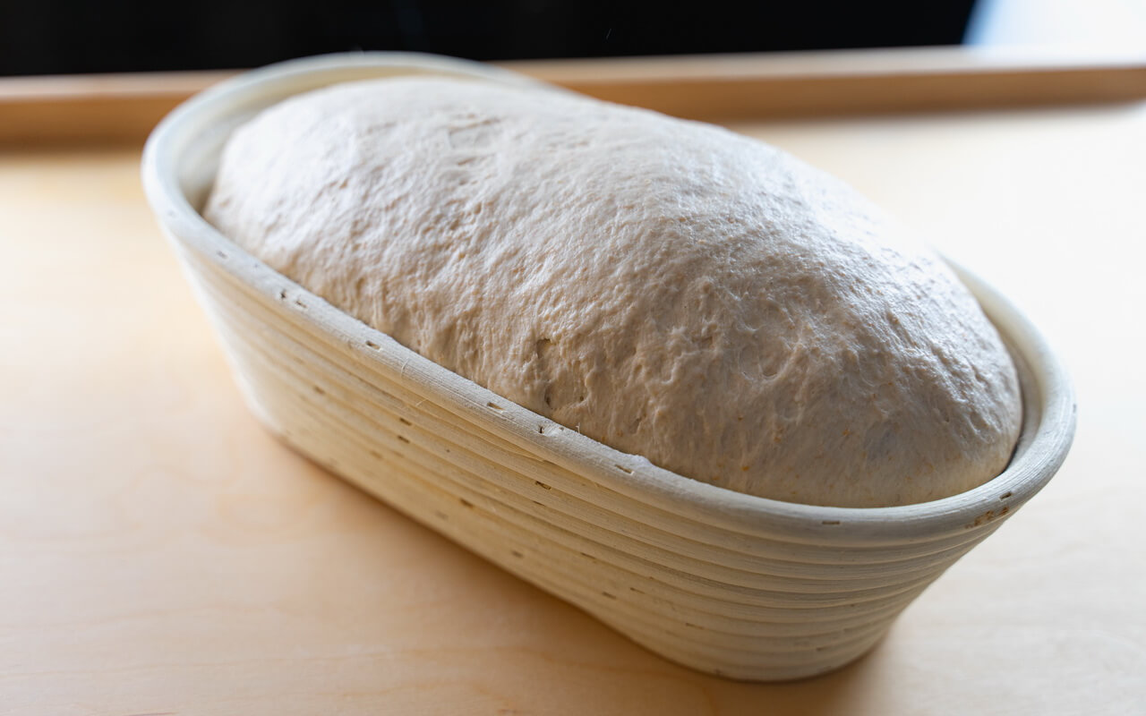 Bread Dough In Banneton Proofing Basket