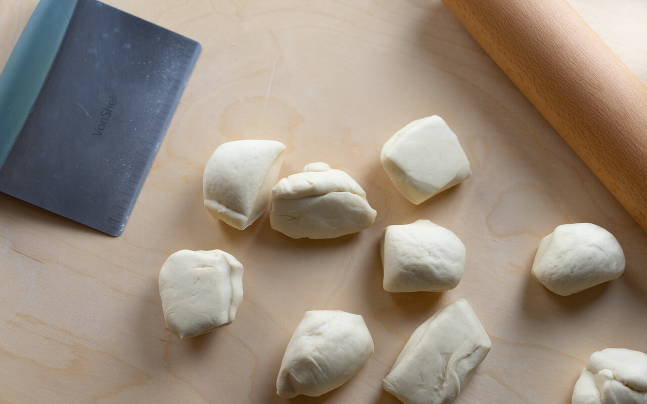 Bread Rolls Dough On Pastry Board